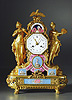 A magnificent late Louis XVI gilt bronze and  polychrome enamel mantle clock